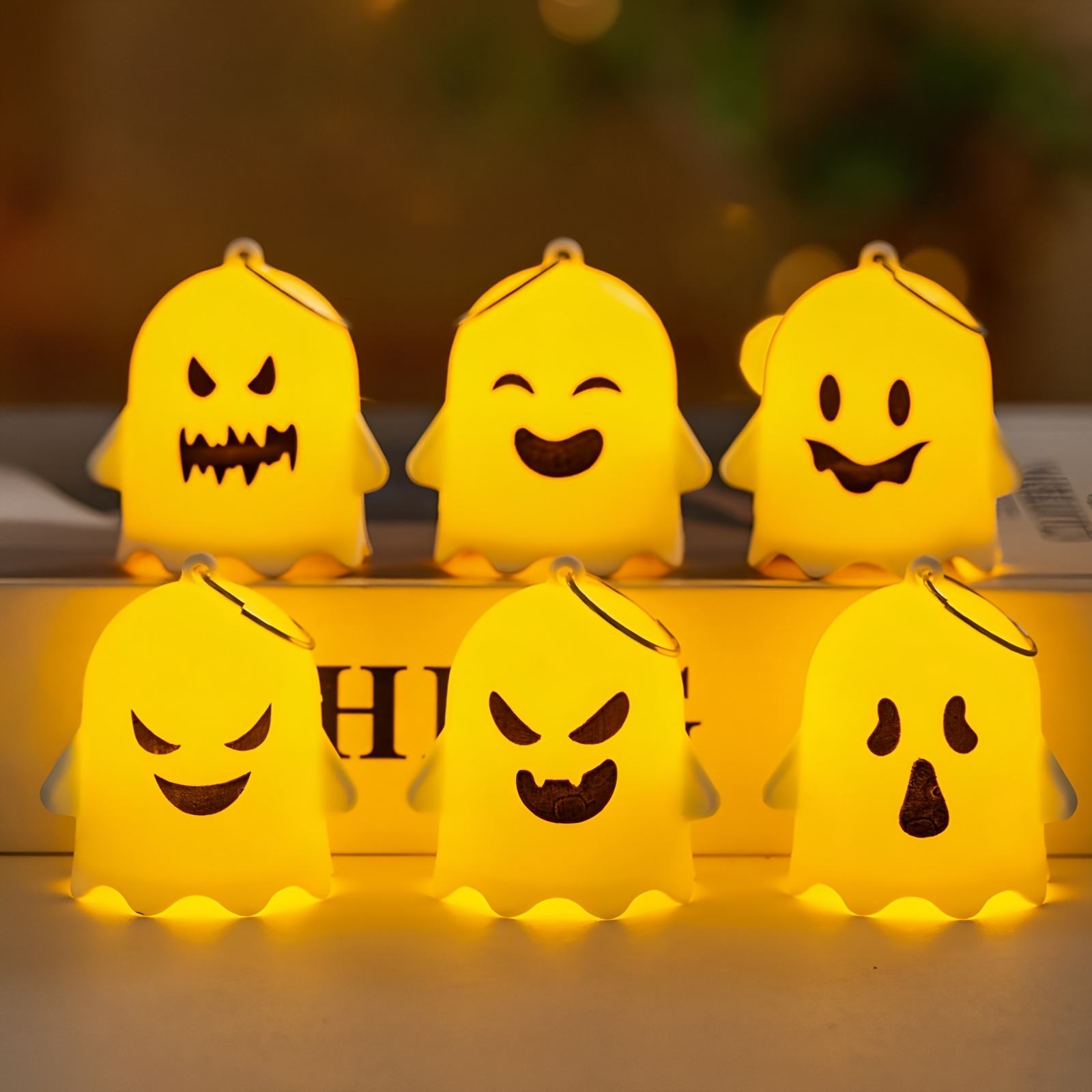 Ghost-garland-and-fairy-lights-decorating-Halloween-living-room